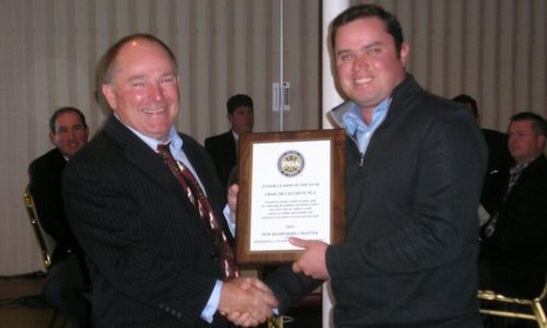 Craig Junior Leader Picture Craig McLaughlin, Candia Woods Head Golf Professional accepting the New Hampshire Chapter Junior Leader of the Year award from NHC President Ken Hamel.