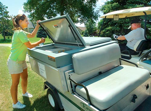 Week, 7_15-07, Terry Mayer, Kristine Sullivan a beverage cart girl at Evergreen golf course.