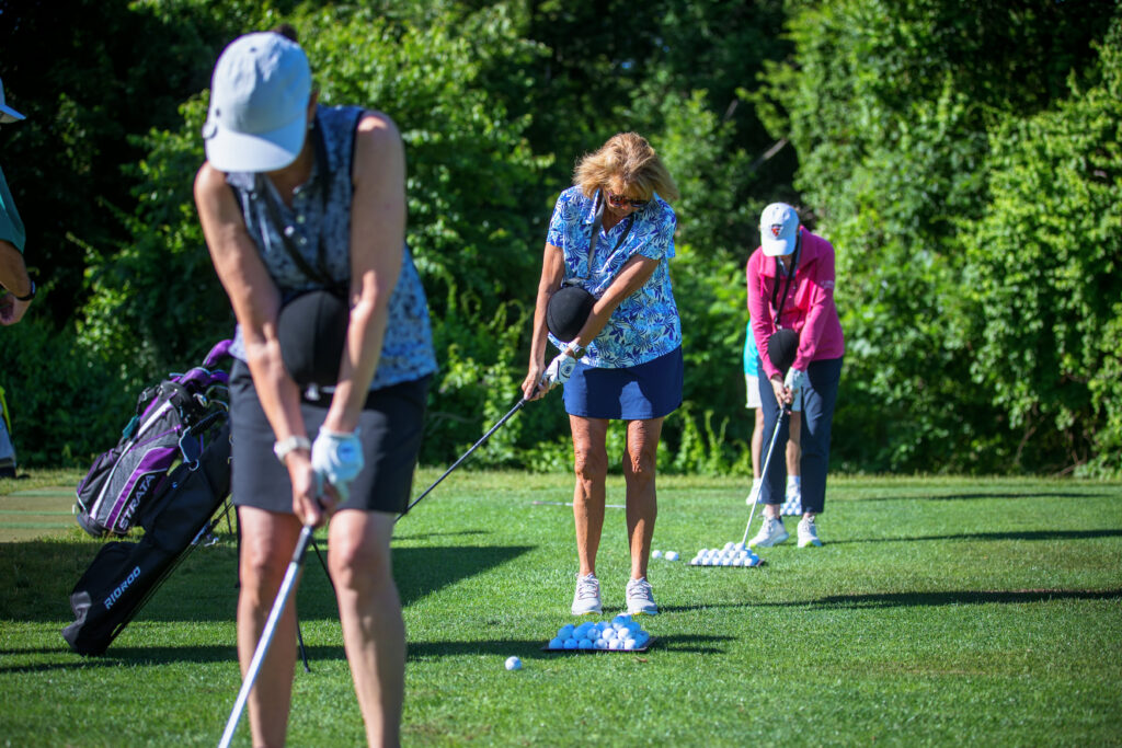 Group of women golfers practicing at Candia Woods Golf Links